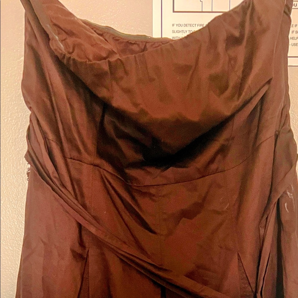 This warm brown strapless dress is a size 12